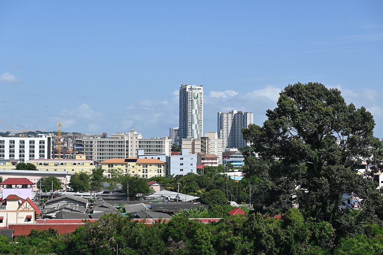 High-rise towers under construction with a tower crane
