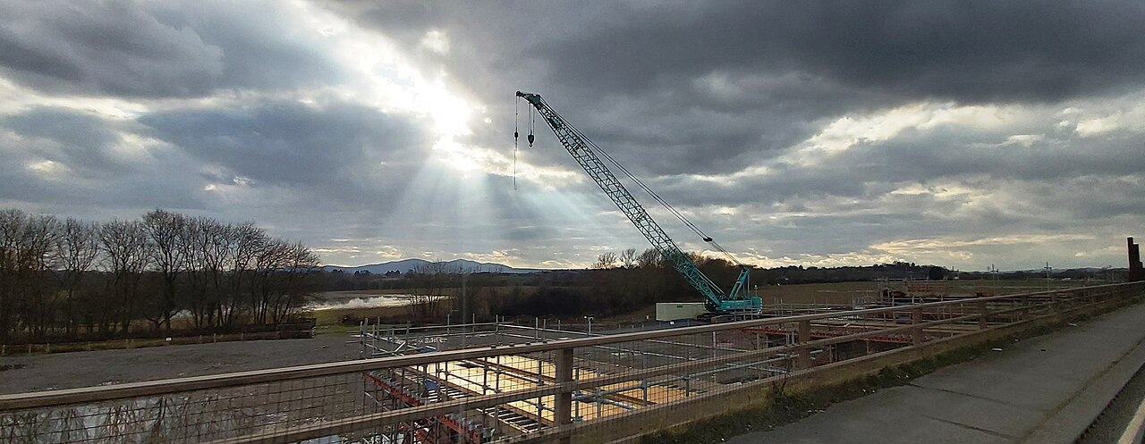 Bridge and highway construction with crane